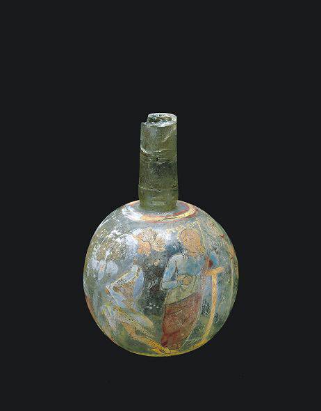 77. Bottiglia smaltata e dorata raffigurante la gara tra Apollo e Marsia (III-IV sec. d.C.). Corning Museum of Glass, New York.