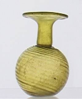 85. Balsamario/bottiglietta in vetro ambrato (seconda metà IV sec. d.C.). Museu d'Arqueologia de Catalunya, Barcelona.