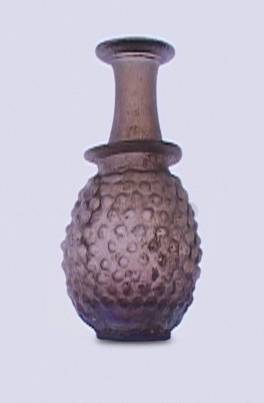55. Balsamario con globetti a rilievo, dalla regione siro-palestinese (III sec. d.C.). Museu d'Arqueologia de Catalunya, Barcelona.